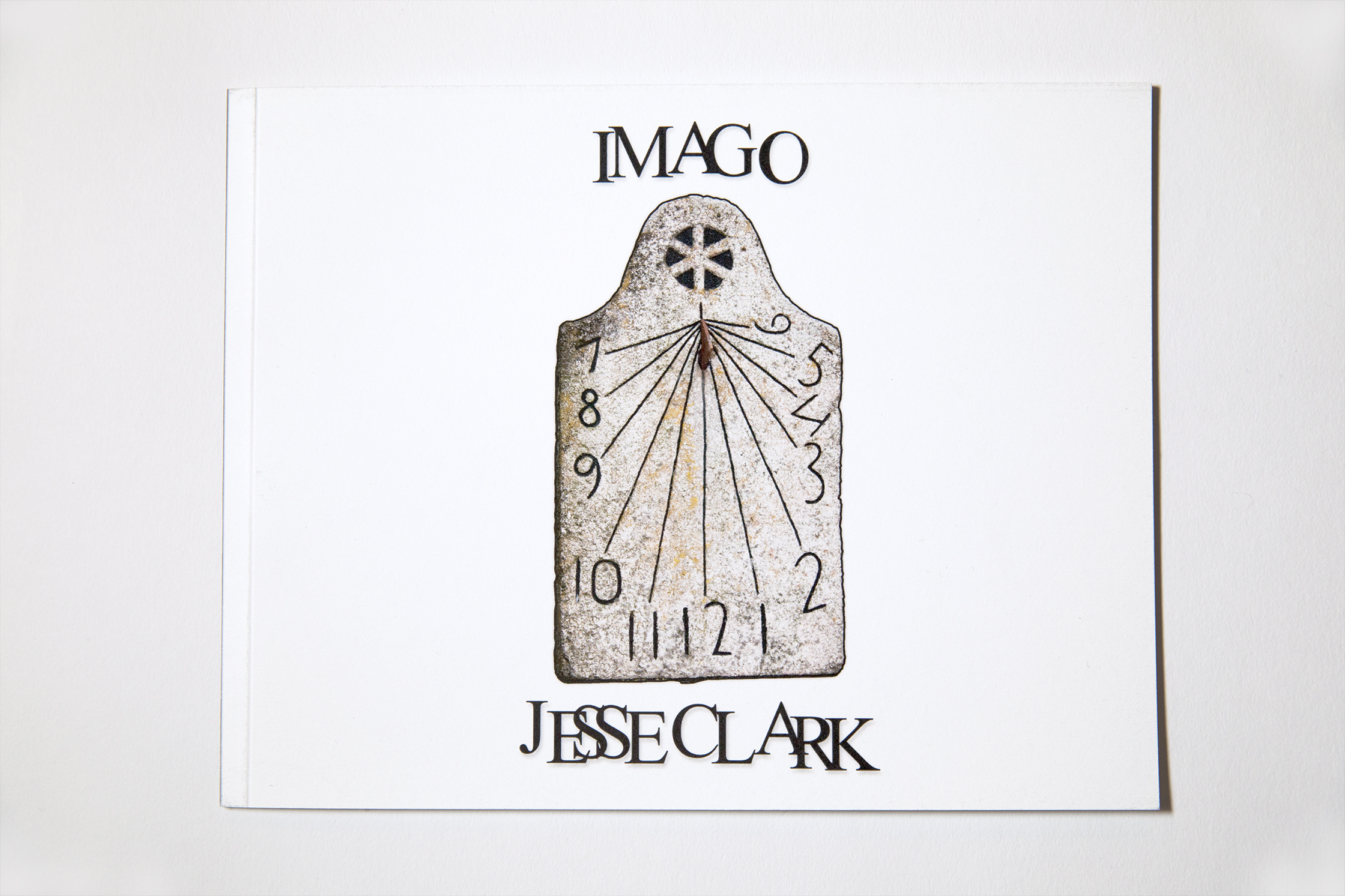 Cover of Imago publication depicting an ancient sundial 